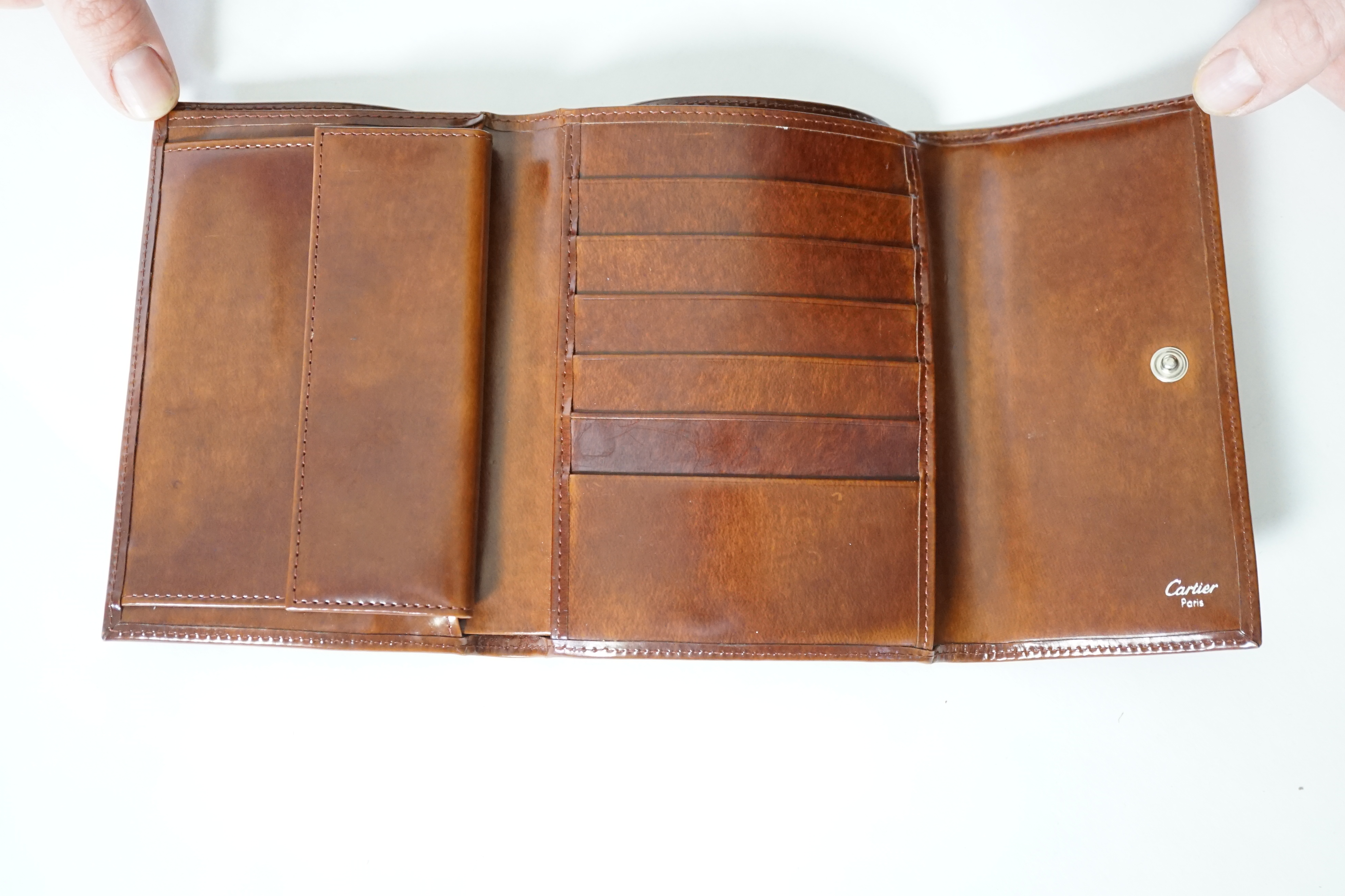 A vintage Cartier Panthere brown leather wallet, height 11cm, width 14.5cm, depth 2cm